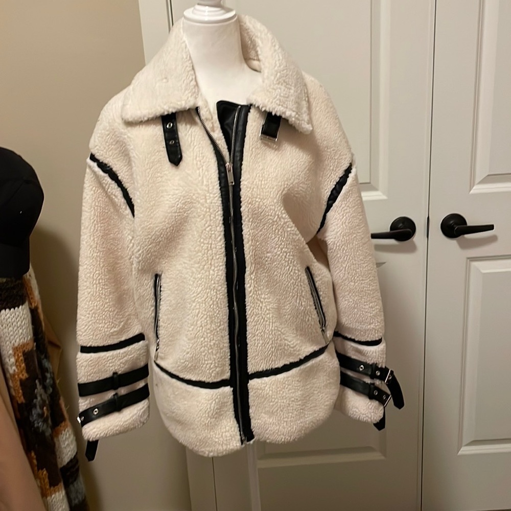 Copper rose cream and black sherpa jacket.